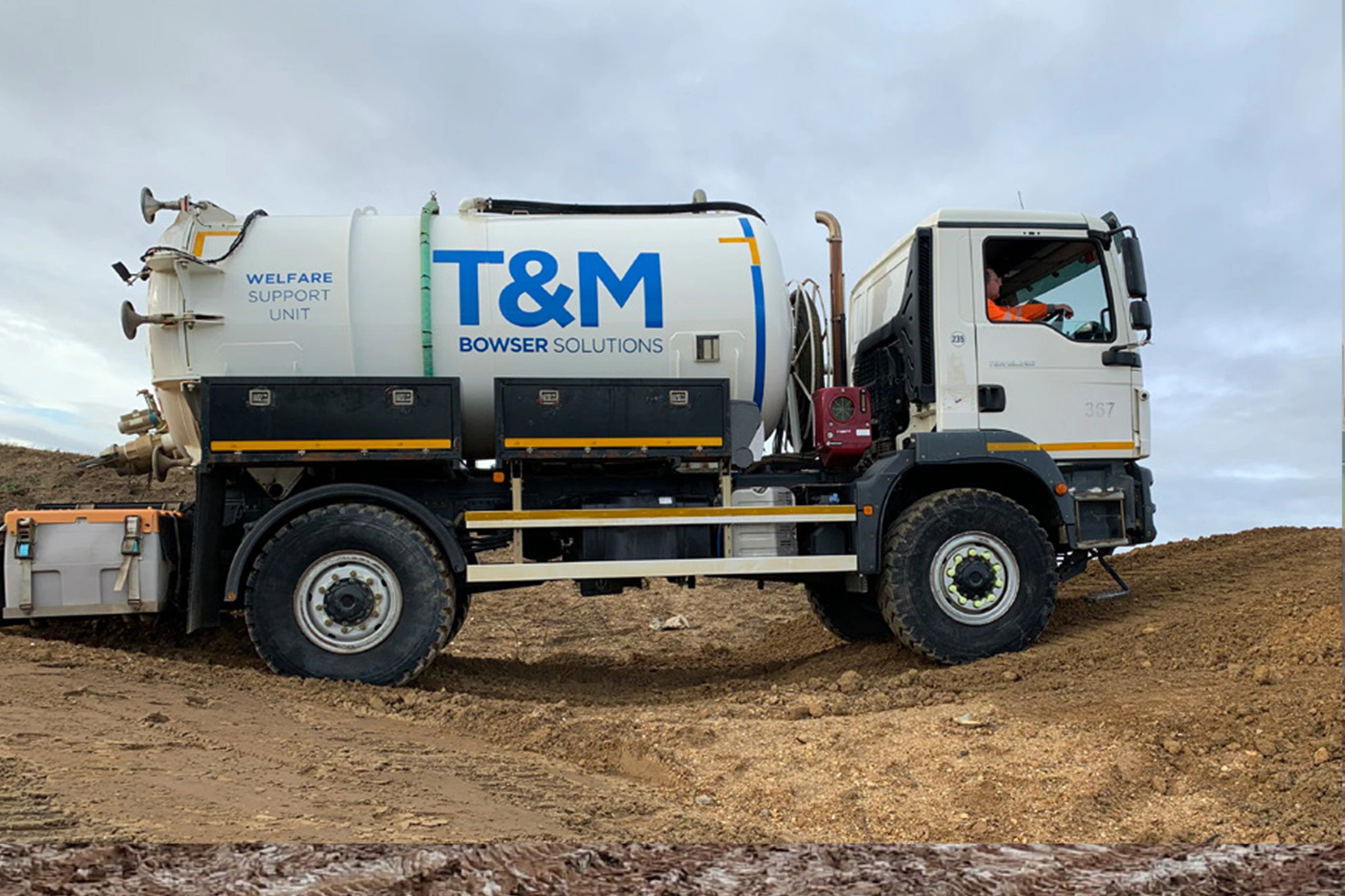 Water Truck with T&M logo on it